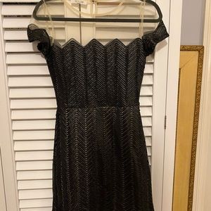 Black dress with nude mess chest and sleeves